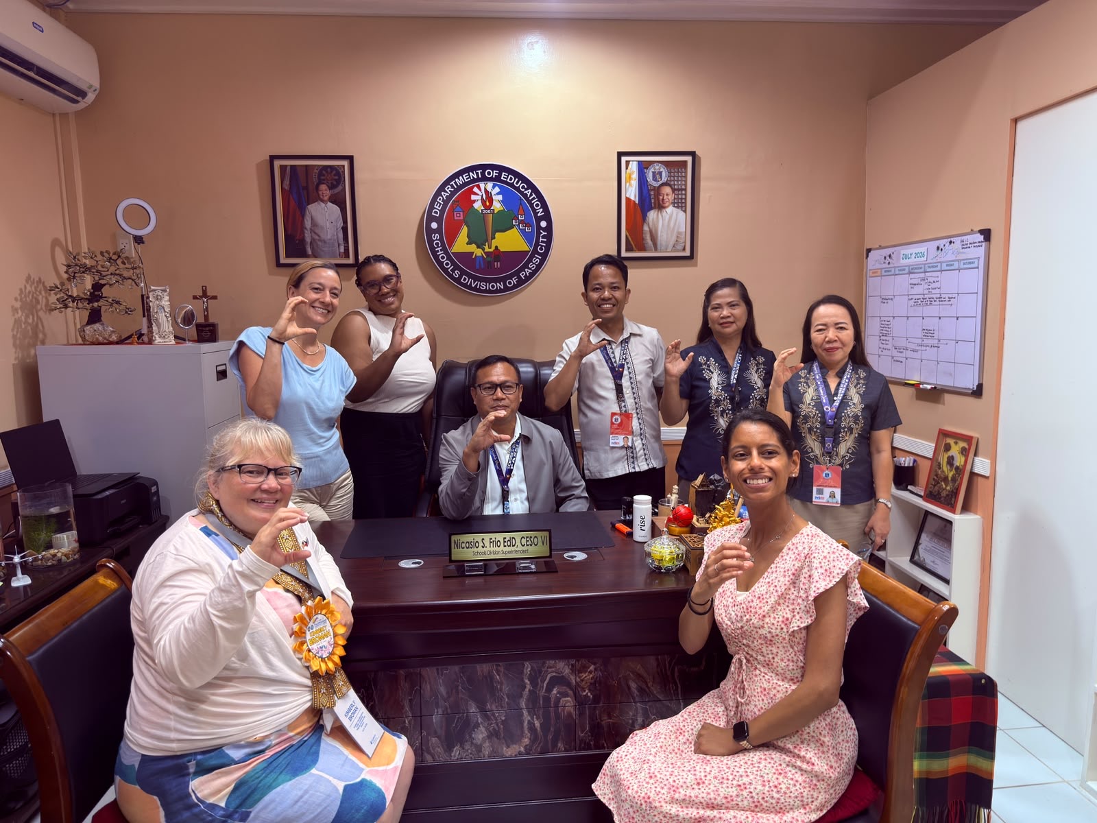 The Fulbright team with Schools Division Superintendent Dr. Nicasio S. Frio in his office.