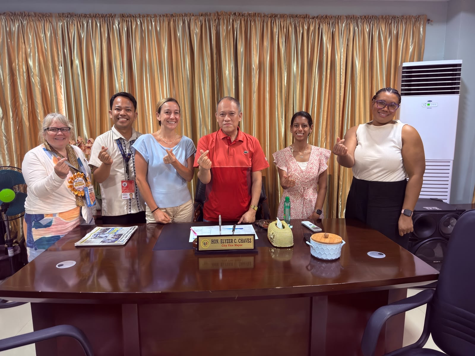 The team with Passi City Vice Mayor Hon. Elyzer C. Chavez at his desk.